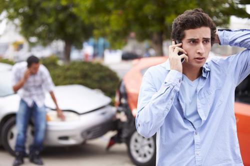 a man calling a lawyer after a car accident in boulder city.